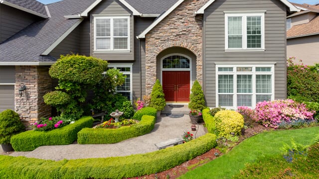 An evergreen border creates a great accent in your front yard. 