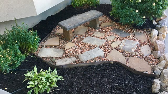 Different types of mulch can be used for front yard landscaping. 