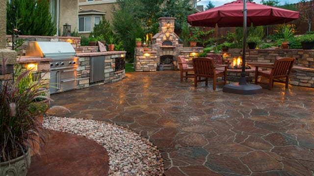 Unique wall and stone pavers make up wonderful entertaining area