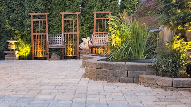 Garden Paver Patio with Trellis Japanese Stone Lantern Pagoda Waterfall Pond and Landscaping Lights